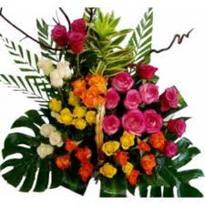 24 Gerberas and Roses with Palm leaves in Basket